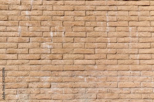 light brown or tan old brick wall background