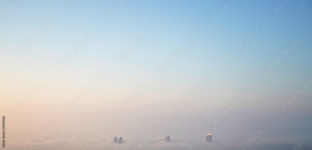 panoramic aerial view on cloudy horizon and sunrise