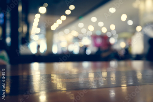 Wallpaper Mural wooden table empty of display in cafe with luxury light decoration Torontodigital.ca
