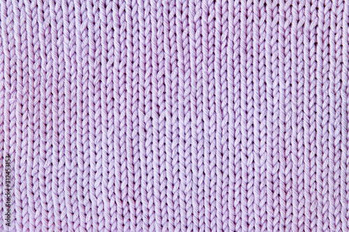 Violet or purple knitted textured background