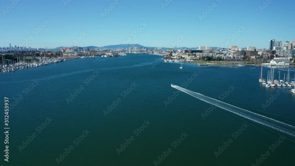 Tracking a motorboat as it streaks across the estuary.