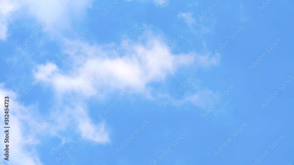 pure white heap cloud moving on blue sky background time lapse pure white heap cloud moving on blue sky background time lapse