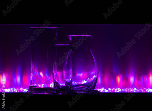Glass vases with fire in the background