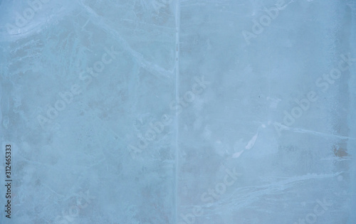 Textured ice blue frozen rink winter background