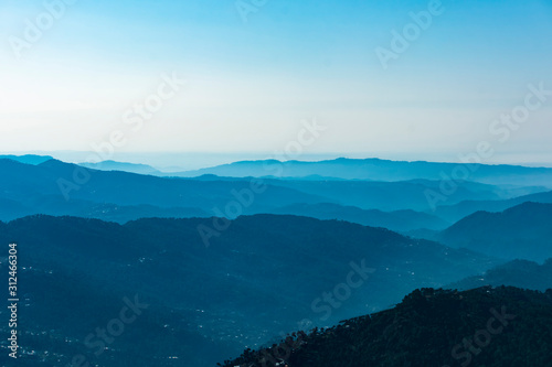 Series of blue Himalayan blue  mountains  during sunrise  © Hussain
