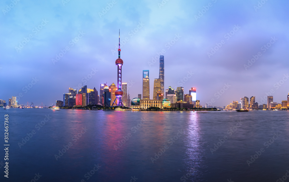 Night empty asphalt road and beautiful cityscape in Shanghai