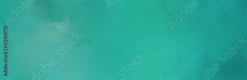 old color brushed vintage texture with light sea green, cadet blue and teal colors. distressed old textured background with space for text or image. can be used as header or banner