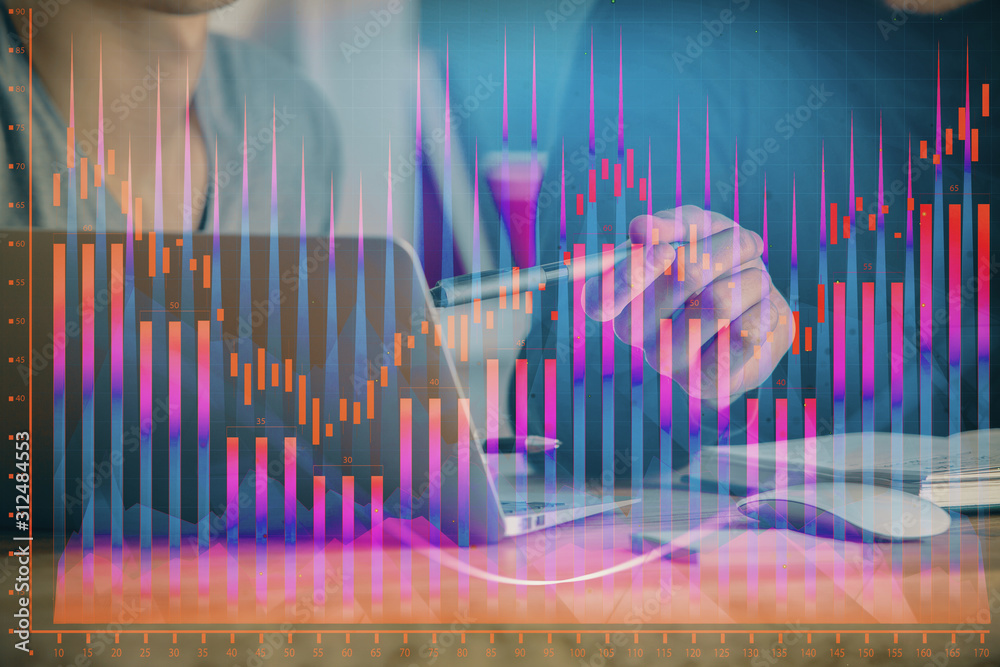 Forex graph with businessman typing on computer in office on background. Concept of analysis. Double exposure. Forex graph with businessman typing on computer in office on background. Concept of analysis. Double exposure.