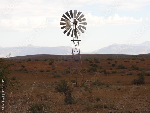 Windmill in late afternoon in Karoo landscape
