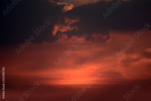 orange sky or blast sky or The explosion cloud sky or Spiritual sun rays through the clouds or Optimistic sunset rays