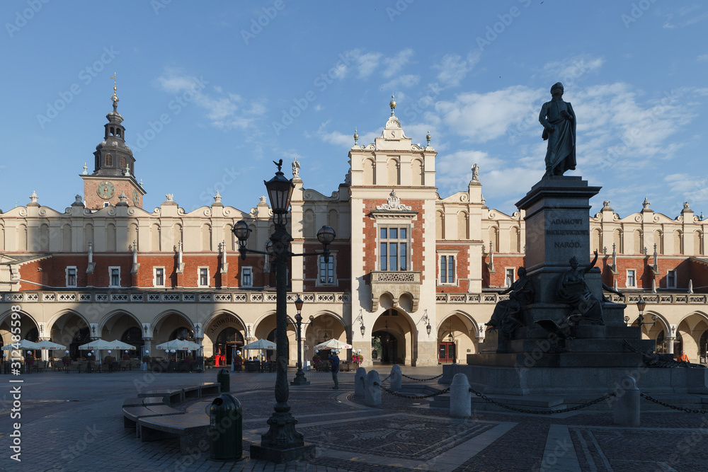 KRAKOW, POLAND - MAY, 12, 2018: Central market square of old town with churches and historical buildings