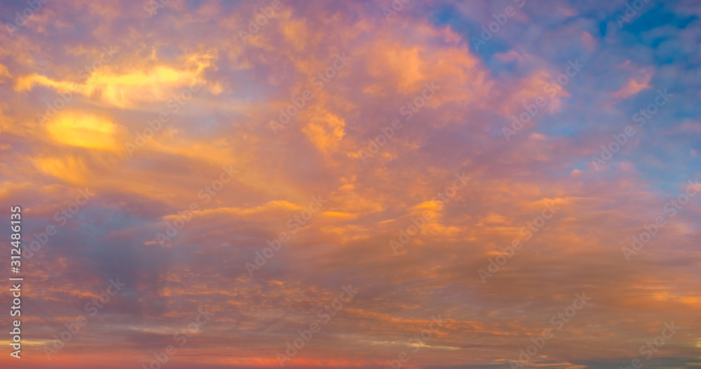 beautifully lit clouds during sunrise