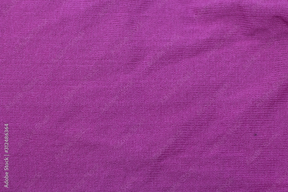 Fototapeta premium texture of purple wool knitted fabric as background