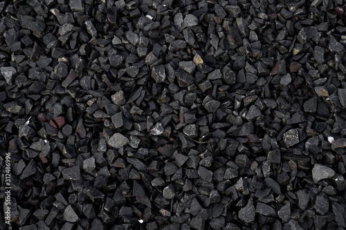 Obraz na plátně Crushed gravel texture background, background made of a closeup of a pile of crushed stone, pile of pebbles, Gravel stone background or texture, stones rubble and gravel