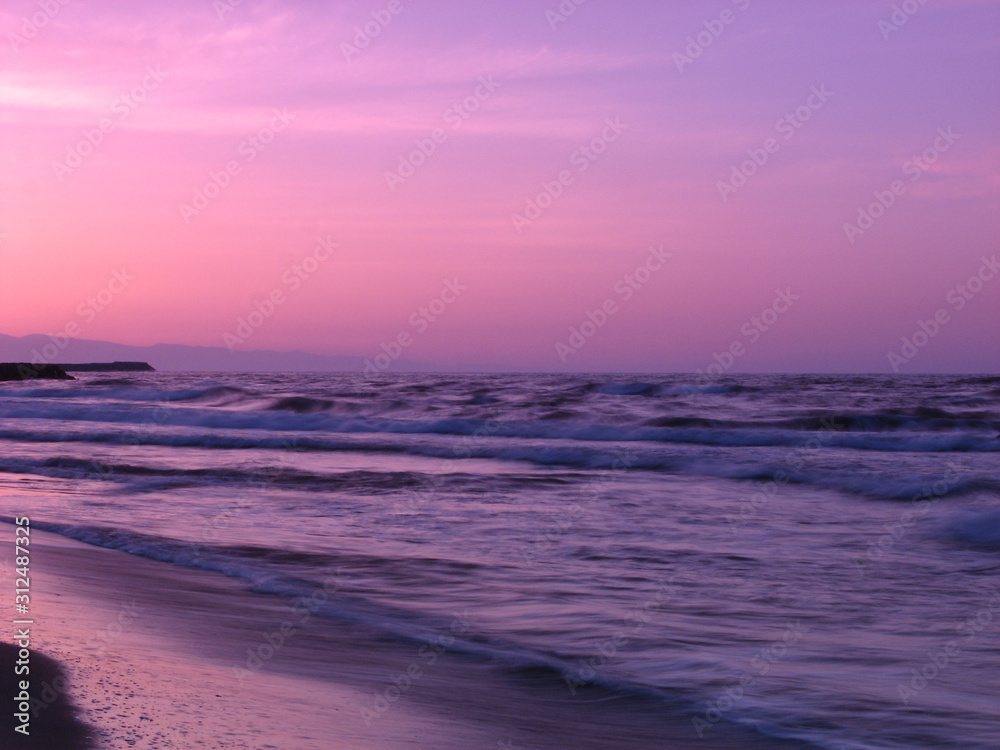Beautiful sunset on sea beach. Beautiful beach sunset in summer day.