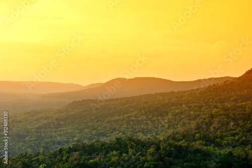 Landscape of mountain hill and orange sky