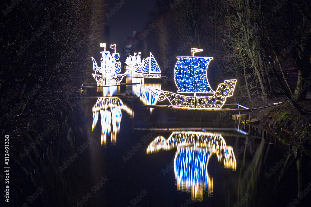 Christmas illumination at city park of Gdansk, Poland - obrazy, fototapety, plakaty 