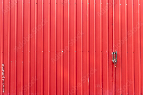 red pastal galvanised door.