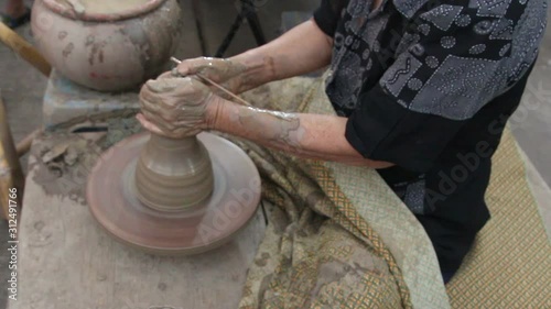 Making clay pot on a potter's wheel