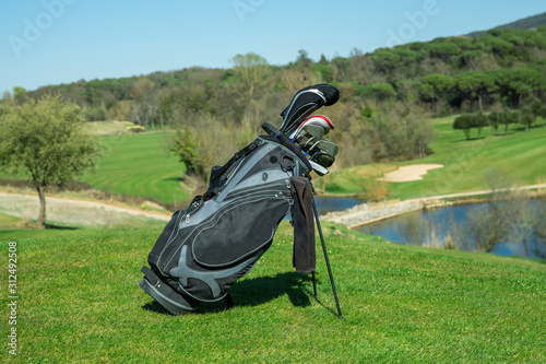 bag of golf clubs to play in a golf field