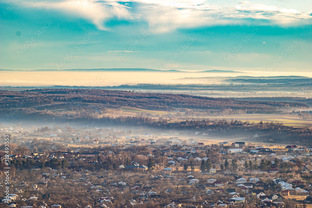 Obraz premium Morning city in the fog