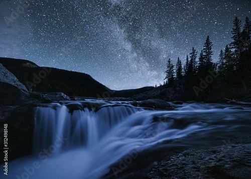Elbow Falls with Milky Way in night sky on national park at Kananaskis
