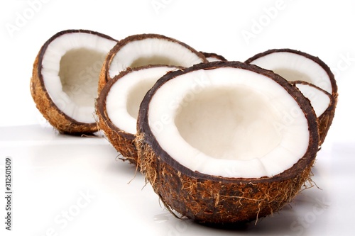 Close up of halved coconuts