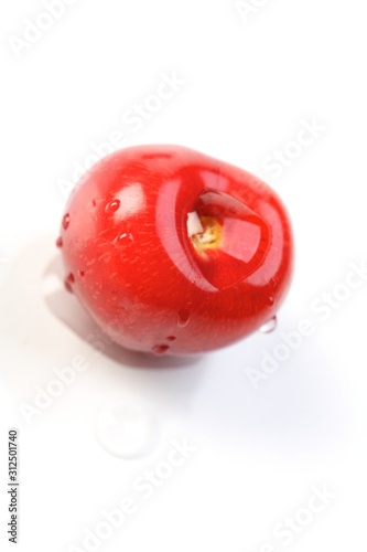 Cherry on white background - close up