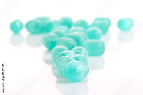 Close up of candies on white background