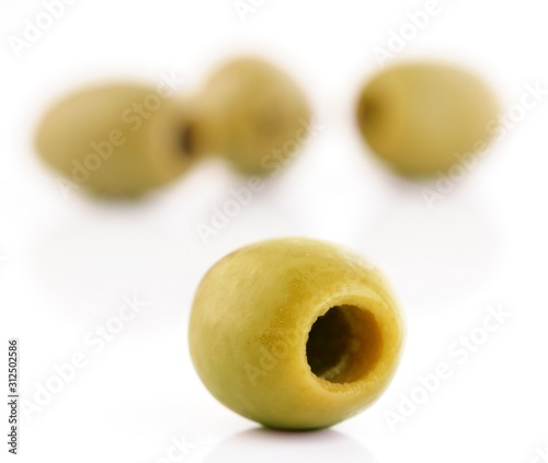 Close up of olives on white background