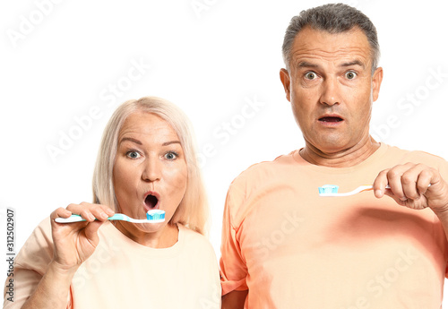Shocked mature couple with ...