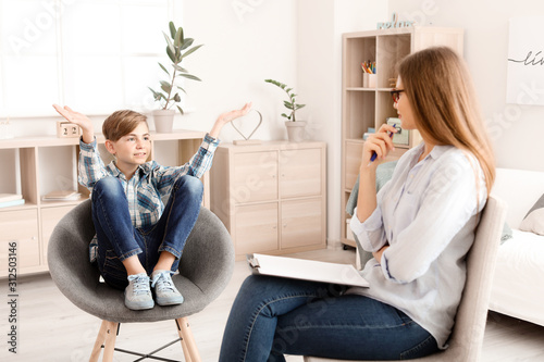 Female psychologist working...