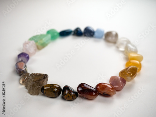 Crystals and gemstones - colorful spectrum arranged white background