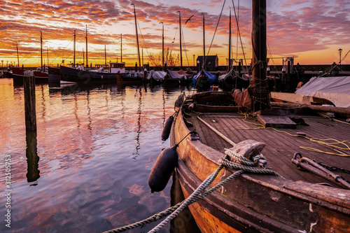 Urk Netherlands Europe, sunrise at the harbor of the small fishing village Urk  photo