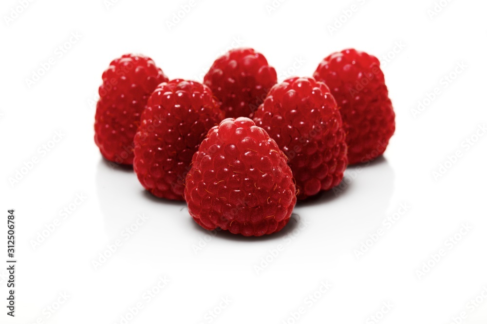 Raspberries on white backbround - close-up Raspberries on white backbround - close-up
