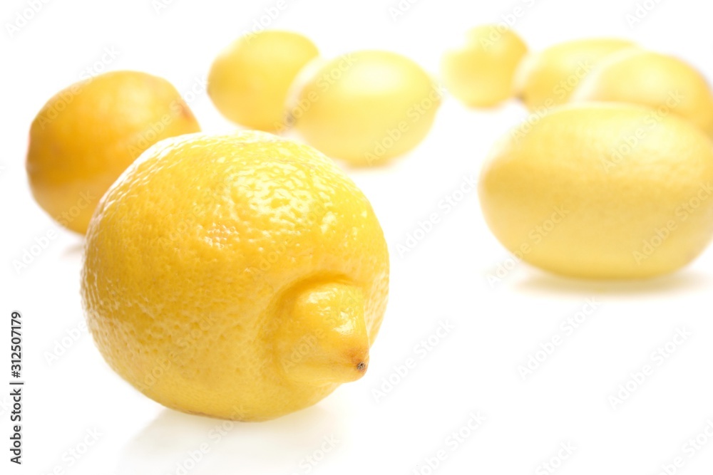 Lemon on white background - close-up Lemon on white background - close-up