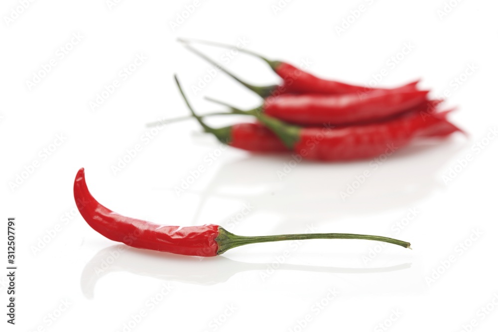 Red chili peppers on white background Red chili peppers on white background