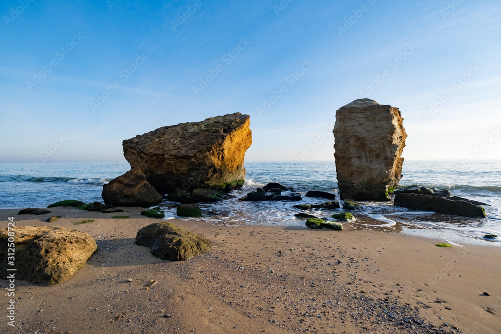 Lanscape of sea cost in sunny day and big rocks Lanscape of sea cost in sunny day and big rocks