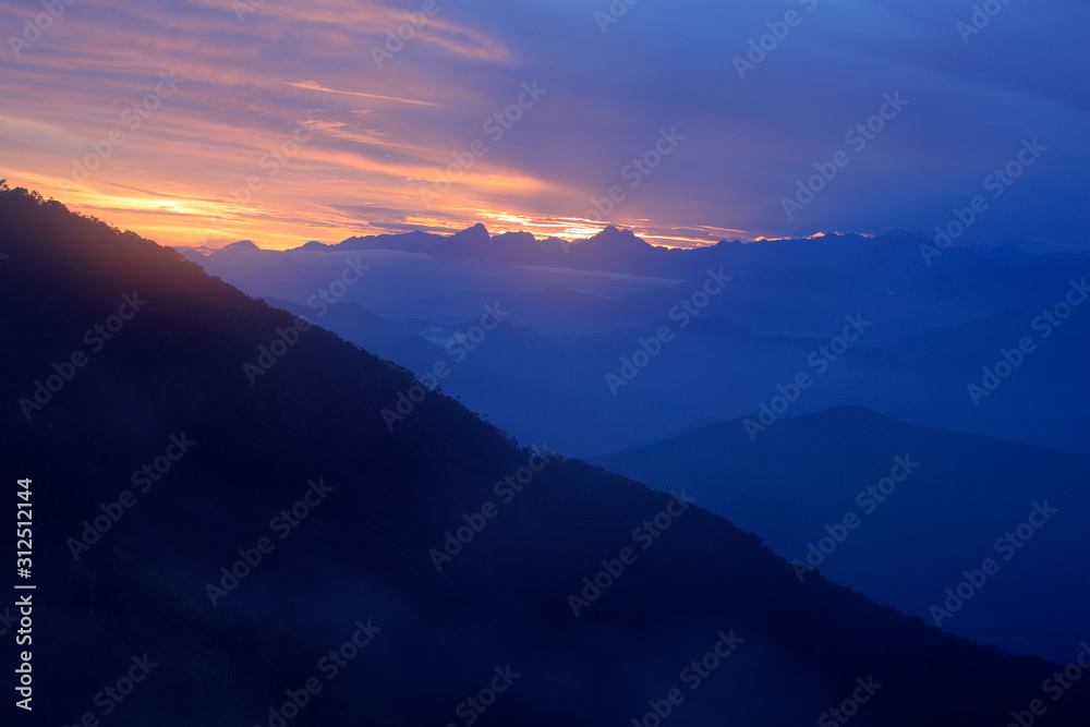 Looking down on Sierra Nevada de Santa Marta, high Andes mountains of the Cordillera, Paz, Colombia. Travel holiday in Colombia. Sunrise in the mountain.