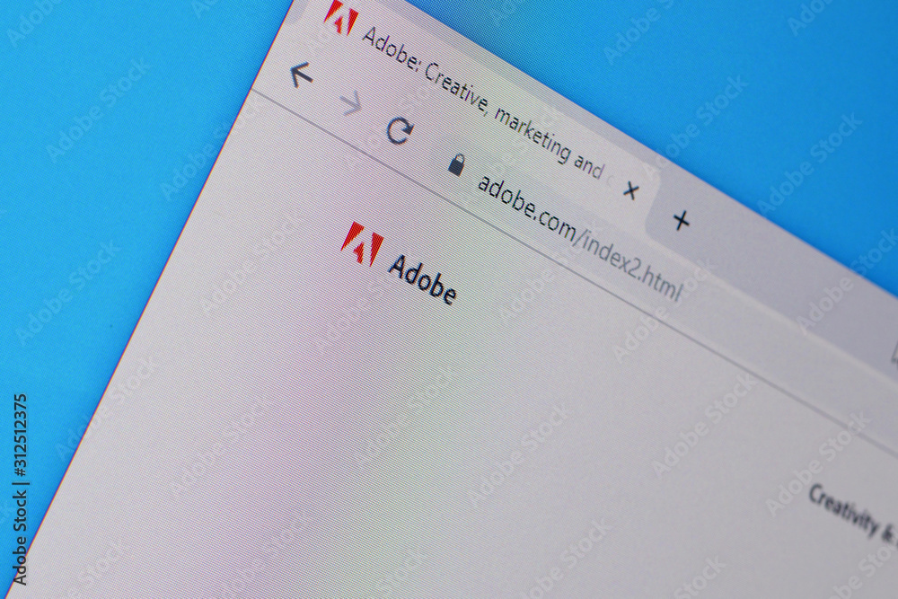 Homepage of adobe website on the display of PC, url 스톡 사진