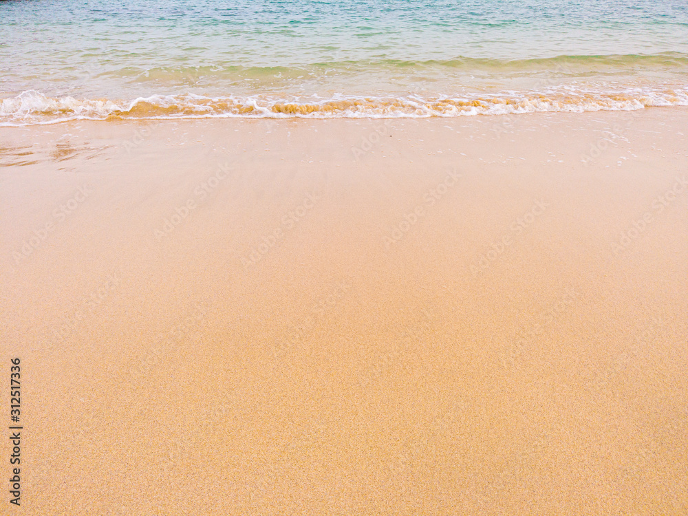 View of blue yellow Water wave ocean sea splash break to a beach sand sandy summer holiday aquamarine azure turquoise vacation tranquil scene copy space background View of blue yellow Water wave ocean sea splash break to a beach sand sandy summer holiday aquamarine azure turquoise vacation tranquil scene copy space background
