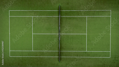 Photo of a tennis green field from a height.