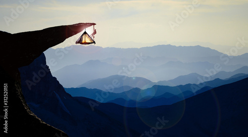 professional climber climbing and camping time photo