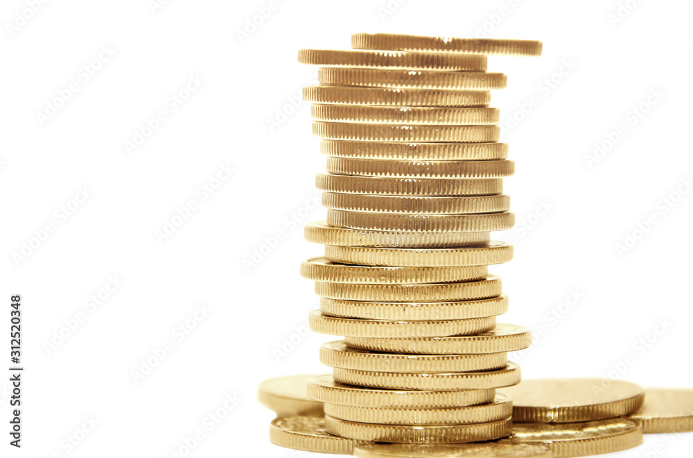 golden coins isolated on white background. Close-up. golden coins isolated on white background. Close-up.
