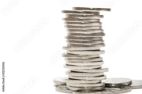 silver coins on a white background. Close-up.