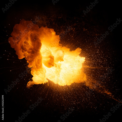 Fotografia Fiery bomb explosion with sparks isolated on black background