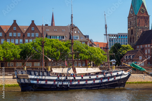 Historic town of Bremen and old sailing ship on Weser river, Germany