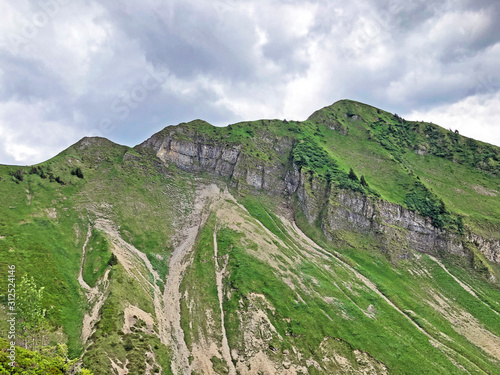 Alpine mountain Turner above the Wagital or Waegital valley and alpine Lake Wagitalersee (Waegitalersee), Innerthal - Canton of Schwyz, Switzerland photo