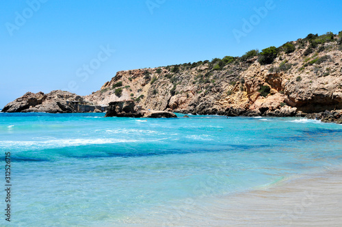 Cala Tarida beach in Ibiza Island, Spain. photo