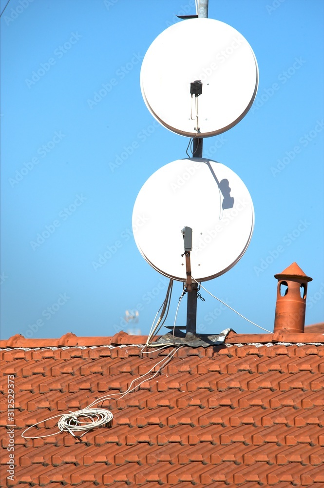 Italy, Lombardy, Milan..view of the old roofs and satellite dish Italy, Lombardy, Milan..view of the old roofs and satellite dish